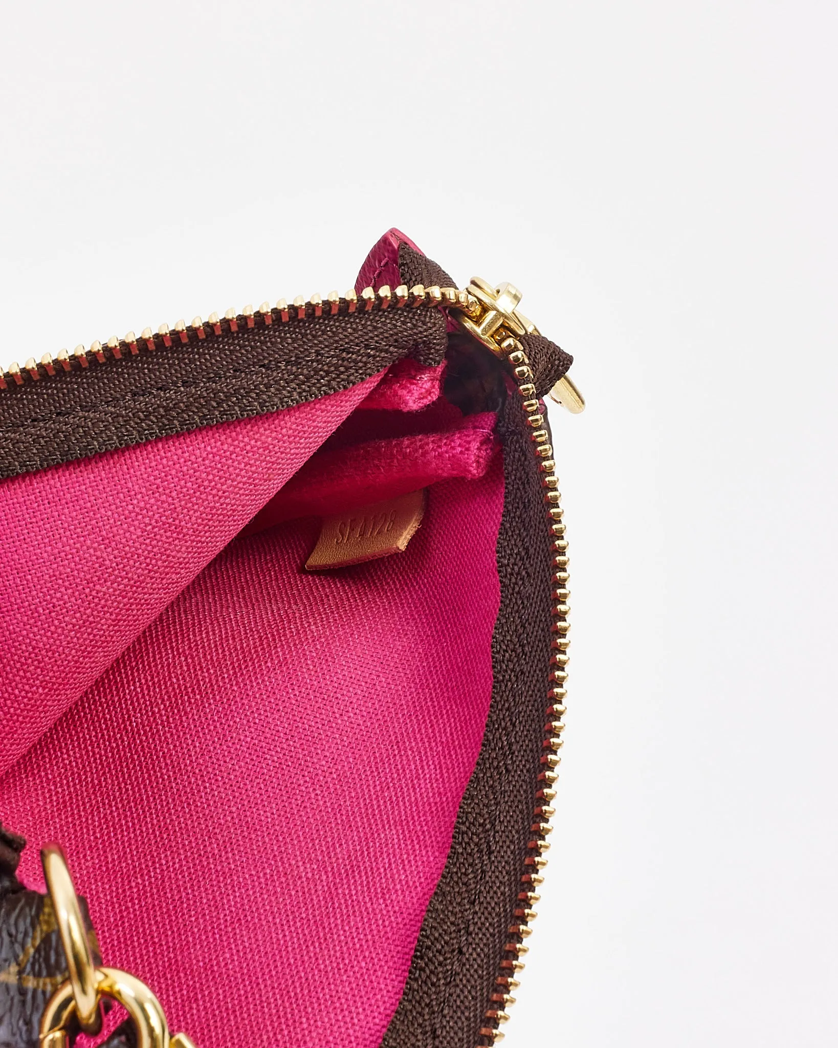 Louis Vuitton Monogram Canvas Flower Ski Mini Pochette Accessoires